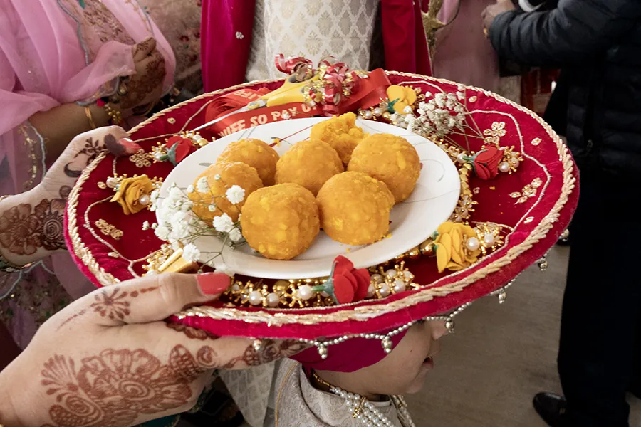 Wedding or cultural celebration detail photographed by Singh Audio & Video.
